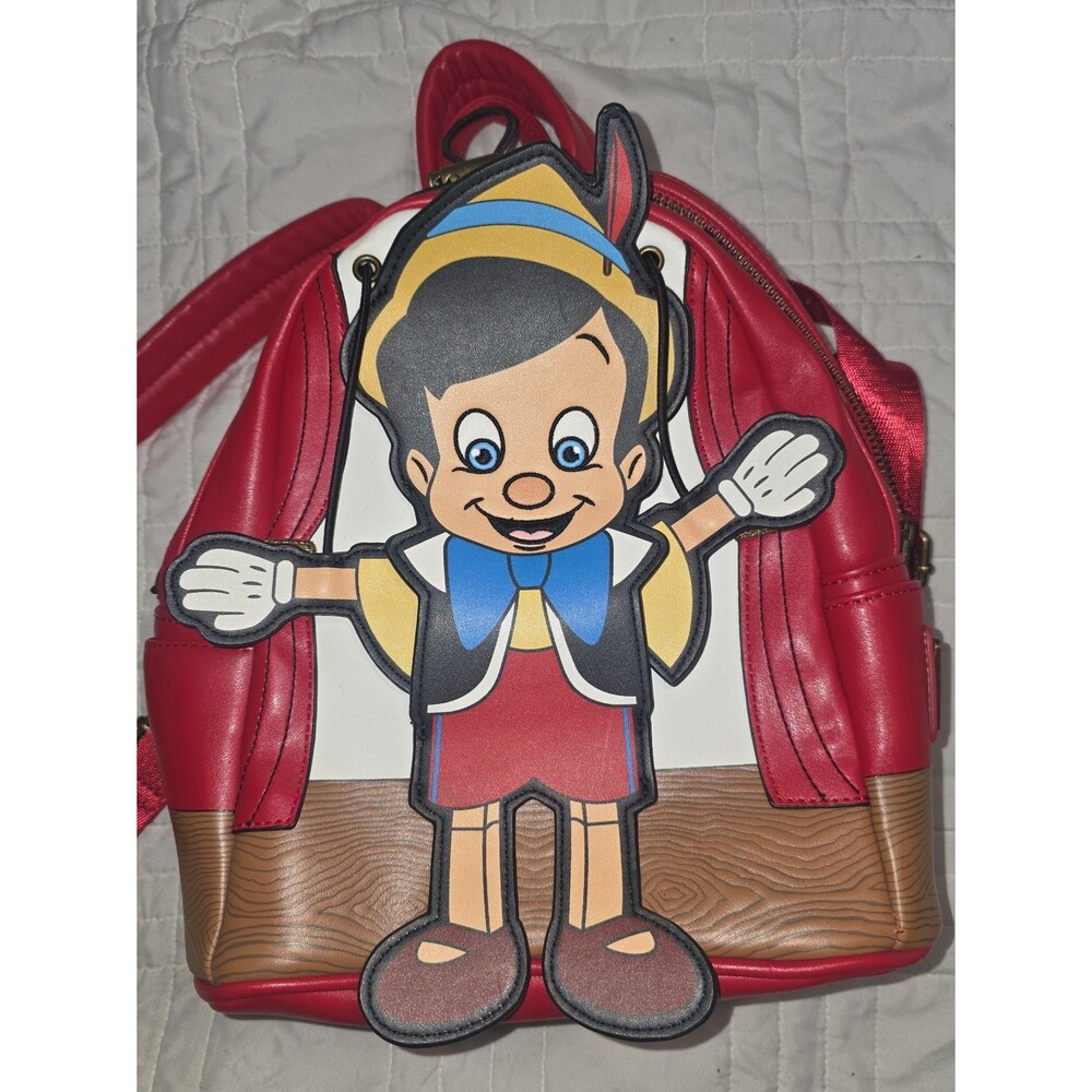 Loungefly Disney Pinocchio mini backpack bookbag w/ moveable arms!